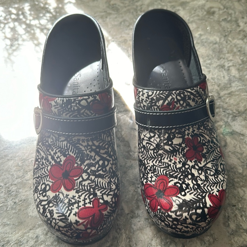 Sanita clogs by Koi